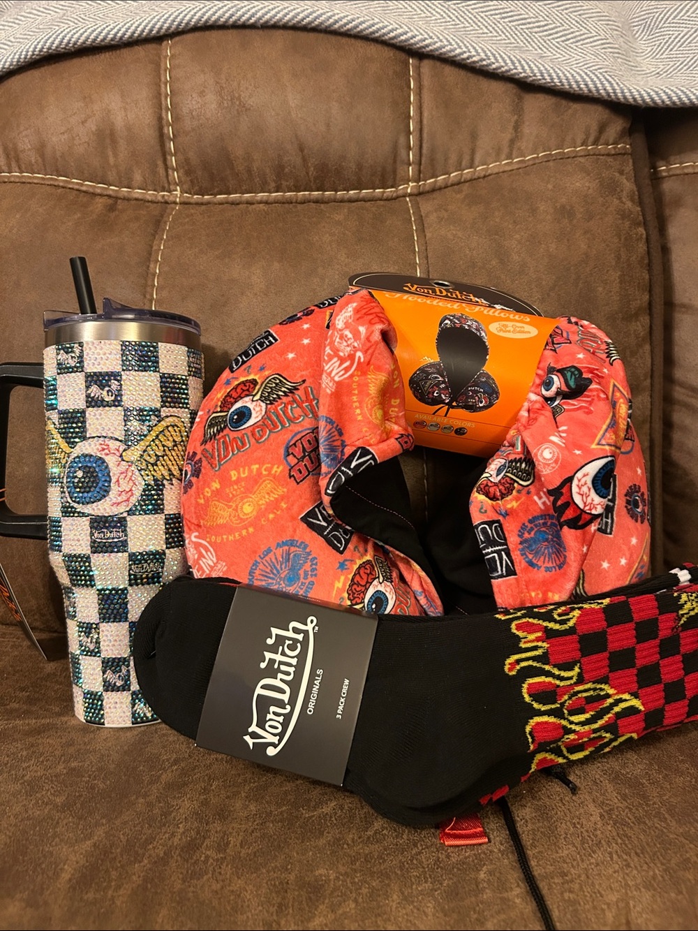 Von Dutch Orange Patterned Travel Neck Pillow, New Tumble with Black Logo Socks